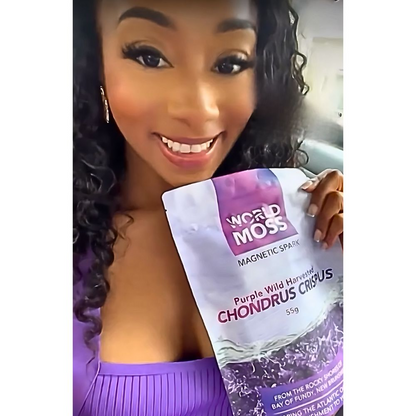 Woman holding World Moss Purple Wild Harvested Canadian Chondrus Crispus package showing product benefits